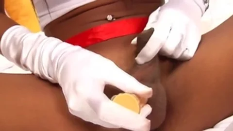 Tanned Ladyboy Nurse Teases With Her large love muffins And long dong